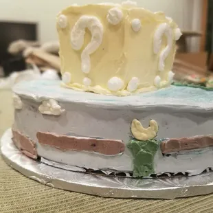 a three layer cake on a table