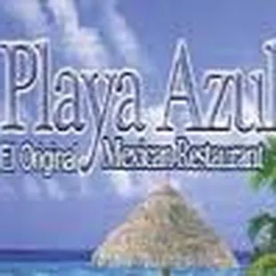 a beach with a thatched umbrella