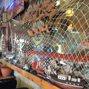 a man sitting at a table in a restaurant