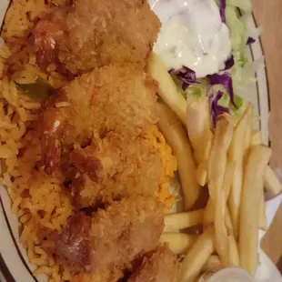 Coconut shrimp is so delicious and their fish soup was amazing. Friendly staff.