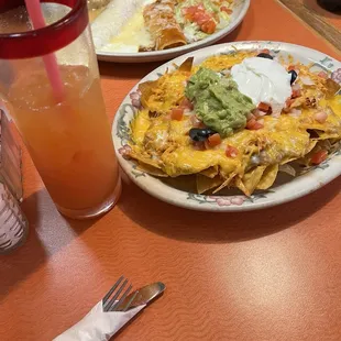 super nachos, tequila sunset, trio enchiladas