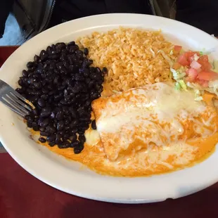 Yummy black beans and enchiladas chipotle, not too spicy