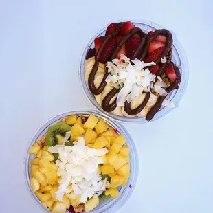 two bowls of fruit and chocolate