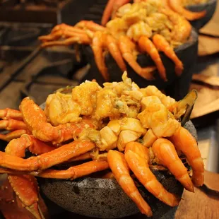 a bowl of crab legs