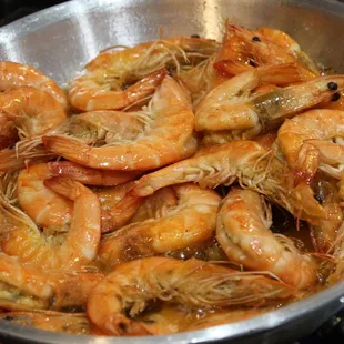 a pan of cooked shrimp