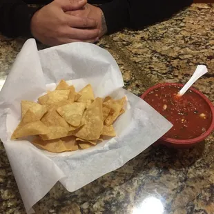 Chips and salsa. The salsa was delish but very salty. The chips were freshly made and good.