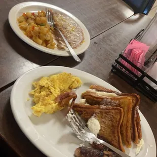 two plates of breakfast food