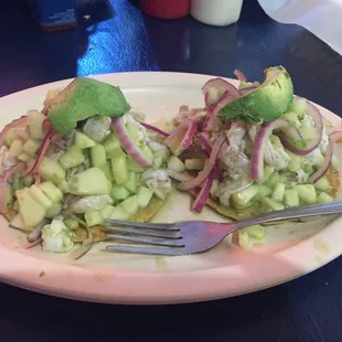 Shrimp ceviche tostada x 2 green she said they were small but they are high!