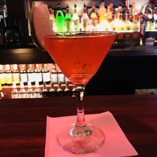 a cocktail in a martini glass