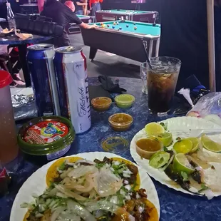 a table full of food and drinks