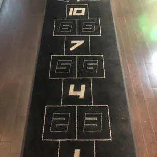 Welcome mat. Yes, I hopscotched my way inside.