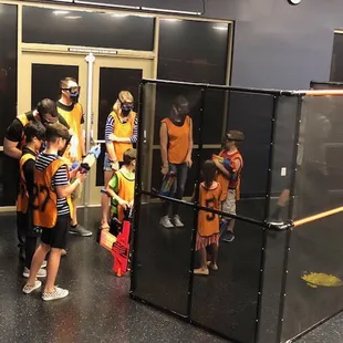 Team meeting to strategize before the assault begins. Everyone has a role and everyone is important. Go get them!