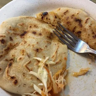 a plate of food and a fork