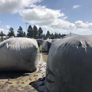 Muddy but fun paintball field.