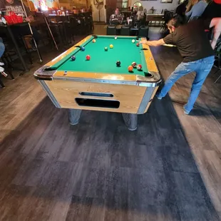 Pool table by patio door
