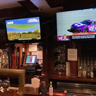 two televisions on the wall
