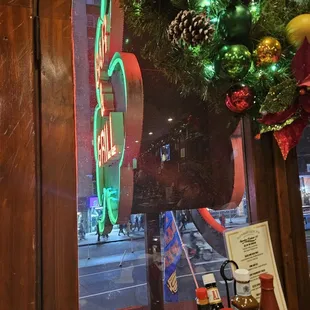 a neon sign in the window
