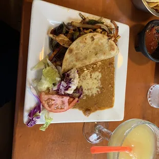 a plate of food and drinks