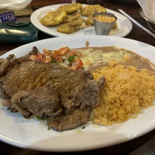 had the Carne Asada with tostones, que rico!!