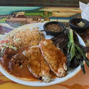 This is the Mexican trio, two bacon wrapped shrimp, chicken in a red sauce and carne asada. Comes with beans and rice. All was very tasty