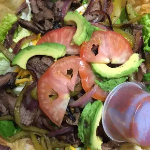 Steak taco salad here is pretty good. The taco shell they used as the bowl was delicious!!! I recommend asking for an extra salsa.