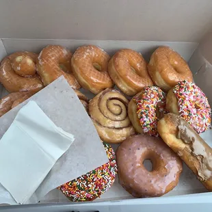 glazed, cinnamon, maple bar, chocolate/strawberry sprinkles, blueberry and donut holes