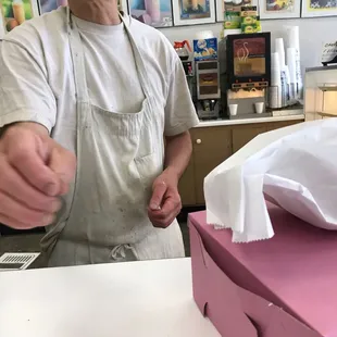 a man making a doughnut