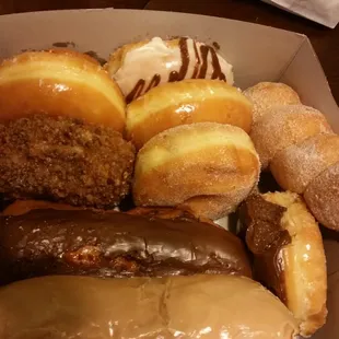 a variety of doughnuts in a box