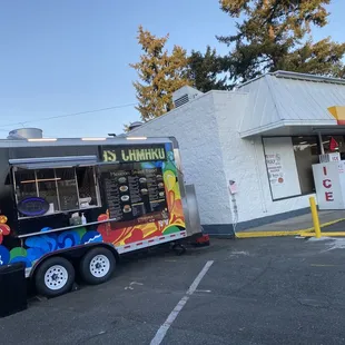 a food truck parked in a parking lot