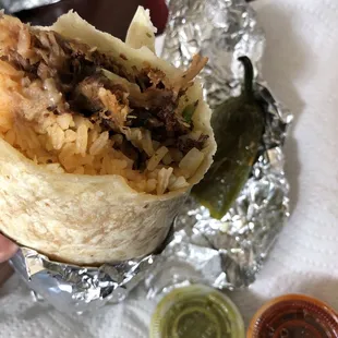 Regular burrito with carnitas. Grilled jalapeño