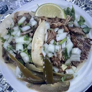 1 Carne Asada &amp; 1 Carnitas taco.