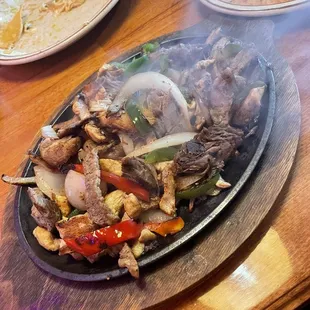 Chicken steak carnitas fajitas