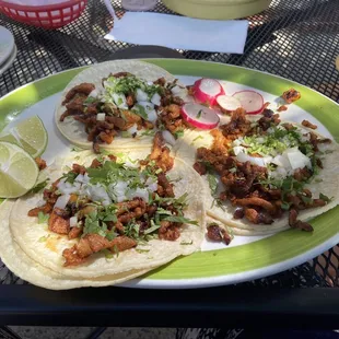 three tacos on a plate