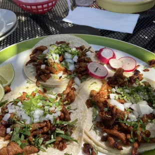 three tacos on a plate