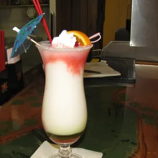 Banderita Pina Colada:  Coconut cream, Pineapple Juice  &amp; Whipped Cream, Midori   $ 6