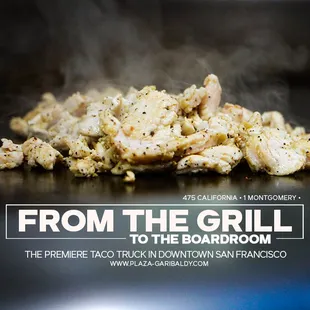 a pile of chicken on a grill