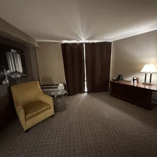 Dirty carpets and used and abused room.