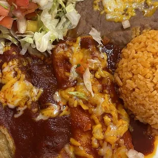 Combination plate: barbacoa taco, cheese enchilada and chile relleno, rice and beans. Delicious!!