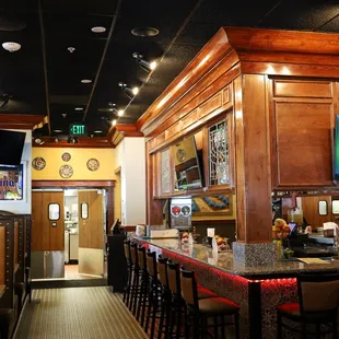 a bar with a television in the background