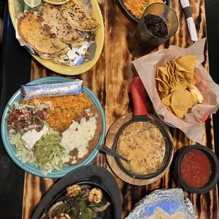 a table full of mexican food