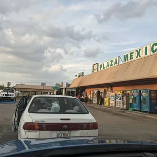 Supermarket on right, food truck on left