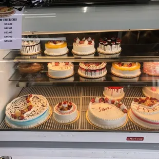 a display of cakes and pastries