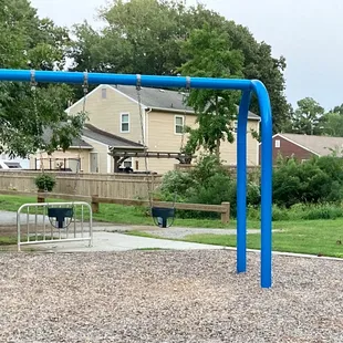 Two baby/toddler swings available and a bike rack
