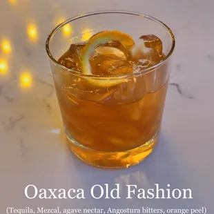 Oaxaca Old Fashion (Tequila, Mezcal, agave nectar, Angostura bitters, orange peel).