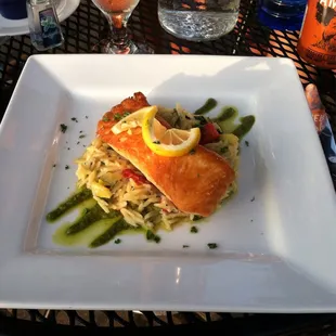 Pan seared Atlantic Salmon. That&apos;s pesto lining the bottom and orzo in the middle. Perfection!