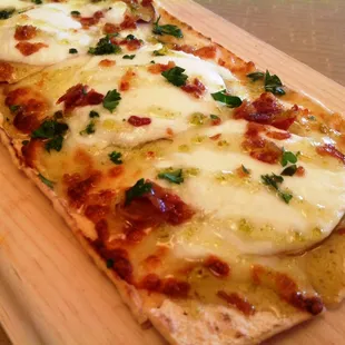 One of our delicious flatbreads - perfect to share as a starter or a meal on its own!
