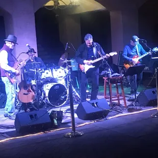 a band performing on stage