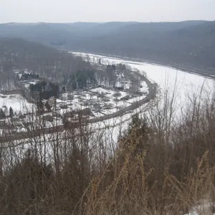 a view of a snow covered valley