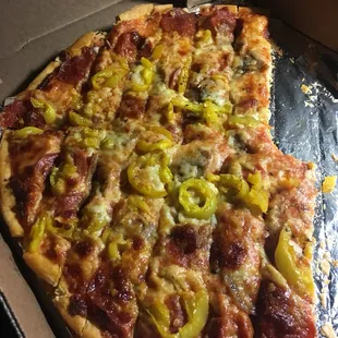 Pepperoni, sausage, banana peppers and extra cheese! DELICIOUS