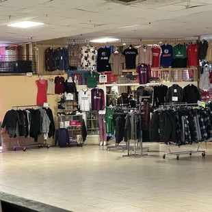 a clothing store with clothes on display